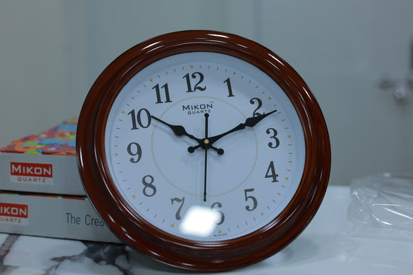 Brown white wall watch